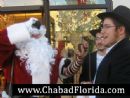 HO, HO, HO, Santa on the go!
Santa Claus Lays Tefillin @ Coconut Creek 1st ever Grand Menorah Lighting in Promenade Mall!
More info on tefillin at www.ChabadFlorida.com/Tefillin HO, HO, HO, Santa on the go!
Santa Claus Lays Tefillin @ Coconut Creek 1st ever Grand Menorah Lighting in Promenade Mall!
More info on tefillin at www.ChabadFlorida.com/Tefillin